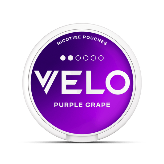 The image represents a purple bottle of 'Mellow By 10 Motives Mini Shots' with a flavor of Purple Grape. The visual design emphasizes the product's compact size and appealing grape flavor.