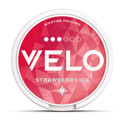 A round container labeled "VELO" in white letters on a pink geometric background, features the text "NICOTINE POUCHES" and "STRAWBERRY ICE" above and below the logo, respectively.